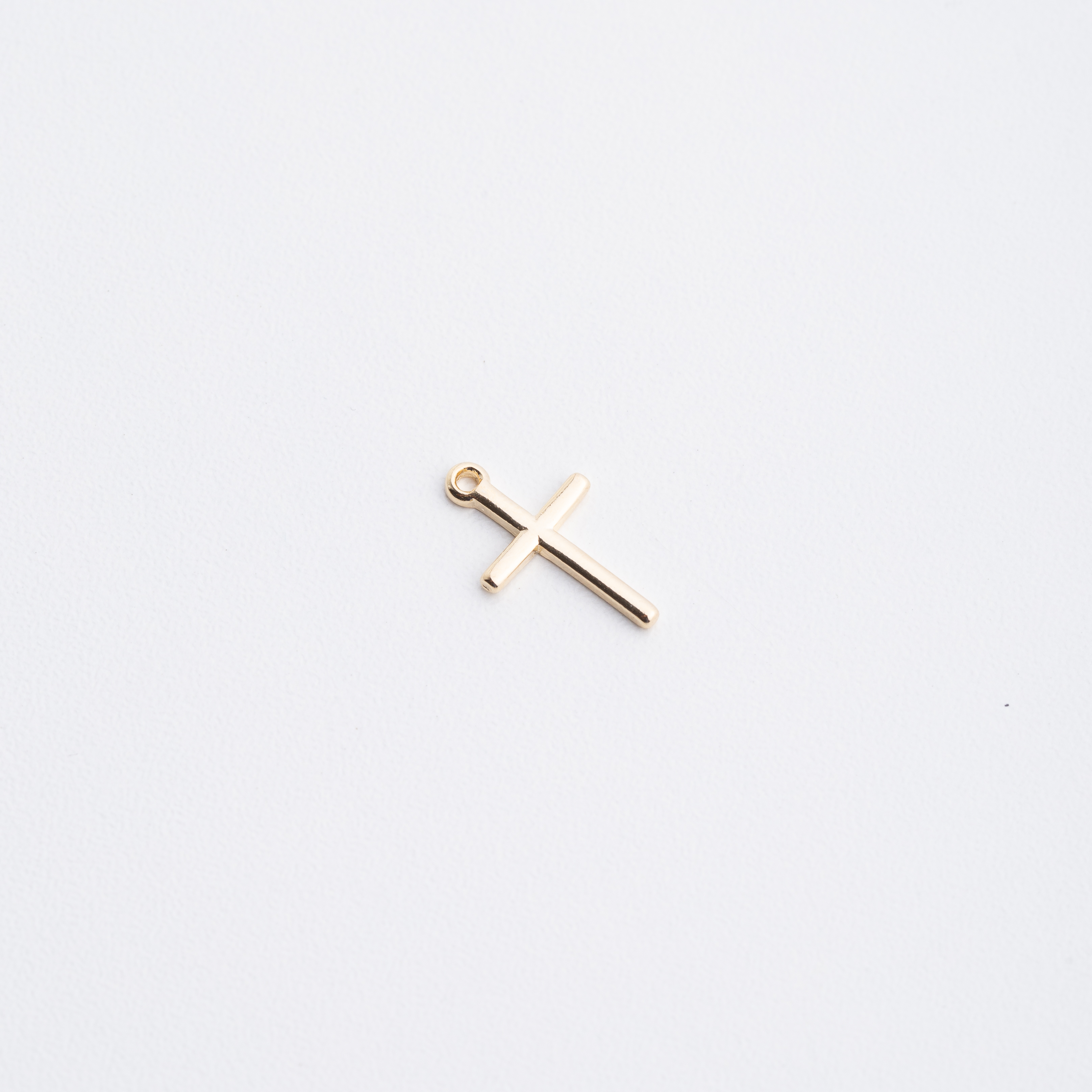 19550 Gold Cross Plane Pendant